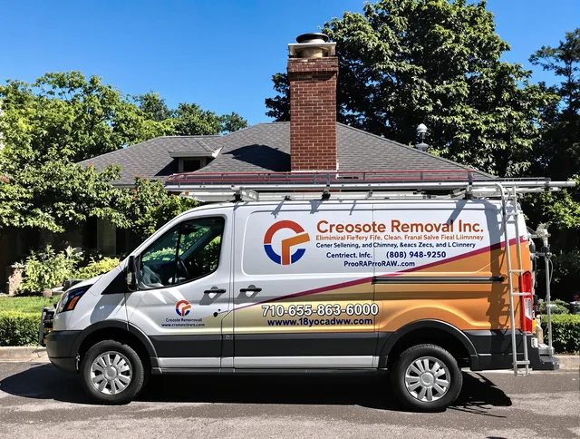 East Bridgewater Chimney Sweep technician removing creosote safely in East Bridgewater, MA