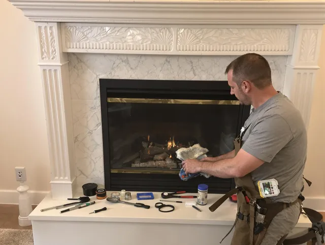 East Bridgewater Chimney Sweep performing fireplace maintenance in East Bridgewater, MA
